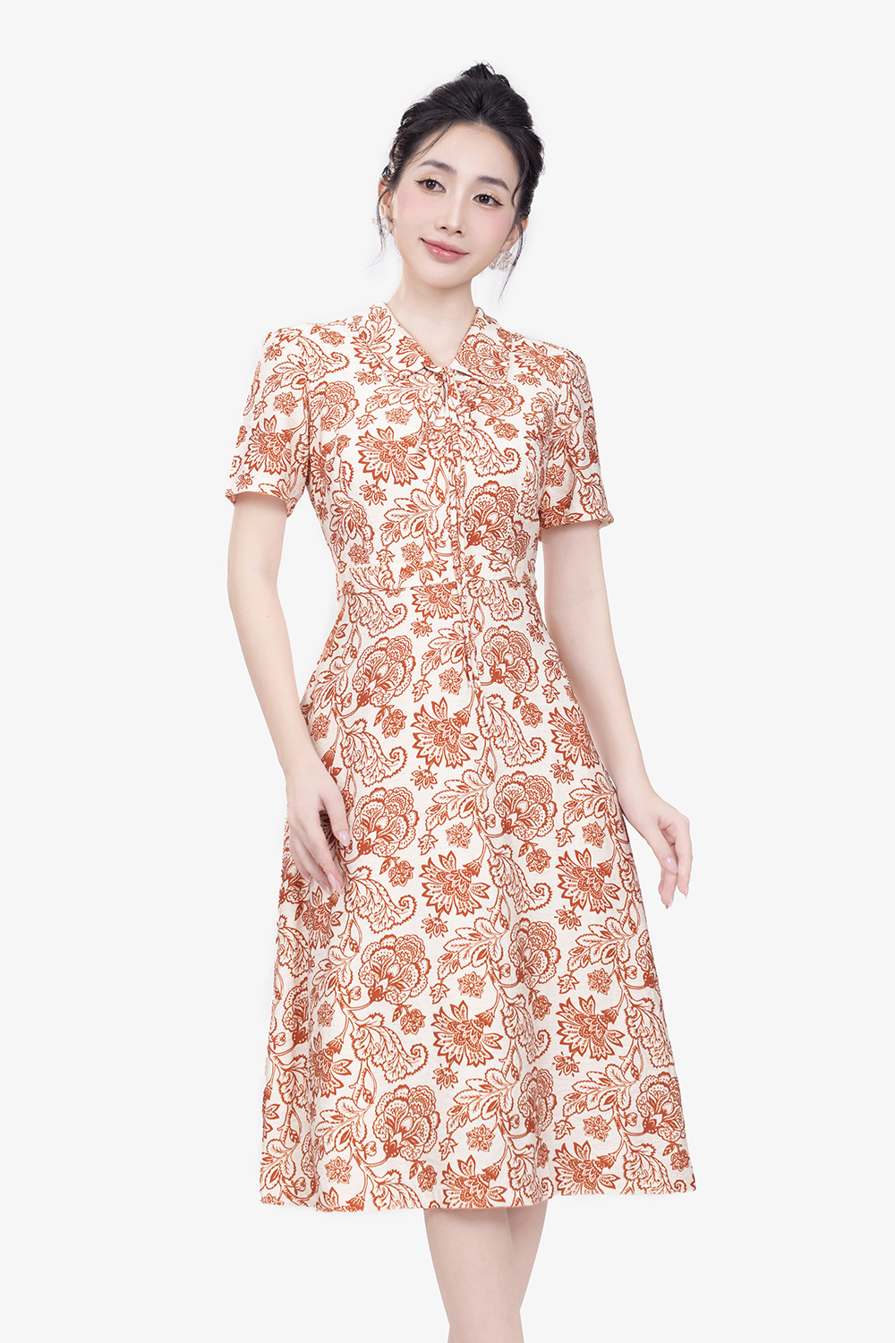 Đầm họa tiết dáng chữ A cổ thắt nơ