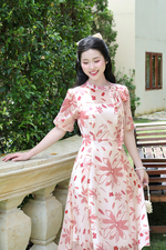 Đầm hoa dáng xòe tay phồng cổ phối nơ