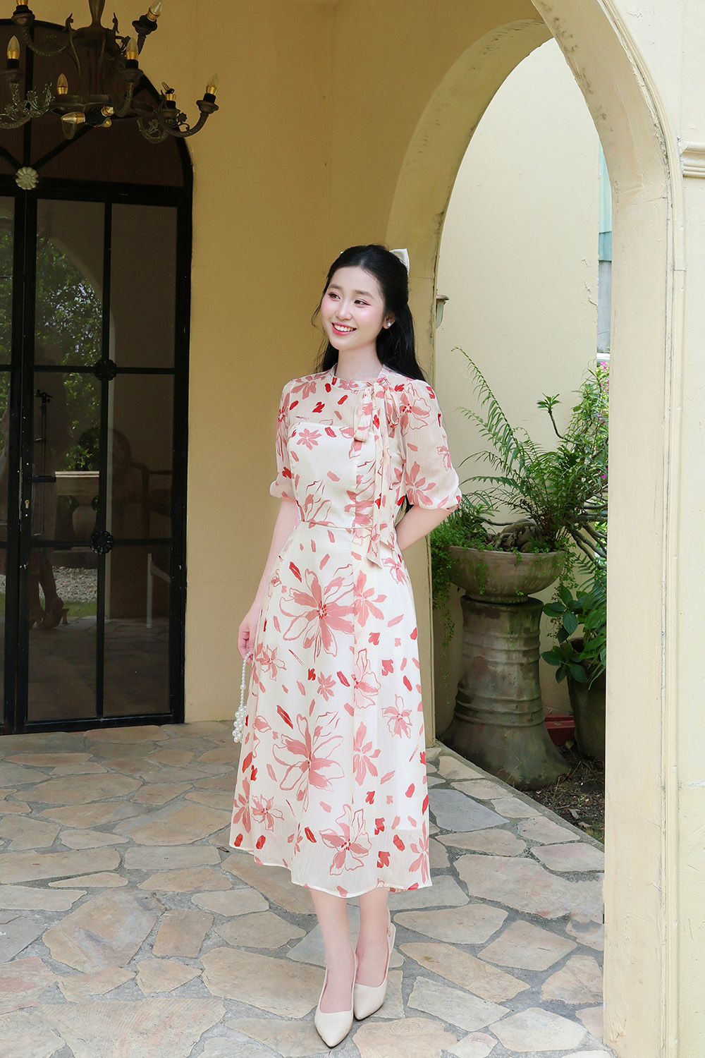 Đầm hoa dáng xòe tay phồng cổ phối nơ