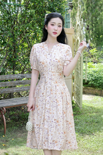 Đầm xòe họa tiết hoa phối nút