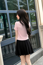 Áo thun gân cotton màu hồng phối nút