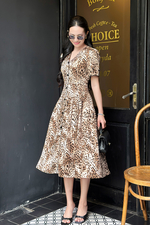 Đầm xòe họa tiết beo cổ V phối viền đen