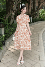 Đầm họa tiết dáng chữ A cổ thắt nơ