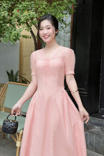 Đầm xòe hồng cổ V đính nơ phối ren