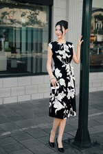 Đầm đen họa tiết trắng tay chờm thắt eo