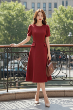 Đầm đỏ dáng xoè phối nắp túi