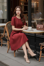 Đầm đỏ dáng xoè phối nắp túi