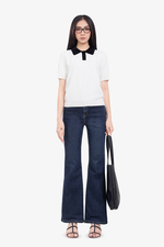 Quần jean ống loe nhẹ màu xanh đậm