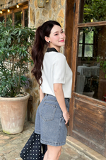 Áo thun dệt kim trắng cổ polo màu đen