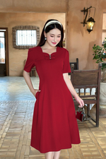 Đầm đỏ dáng chữ A xòe phối nơ