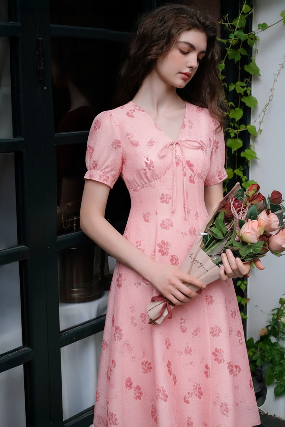 Đầm hoa dáng chữ A xòe cổ V đính nơ