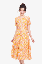 Đầm hoa nhí dáng xòe đính nút