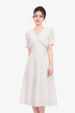 Đầm trắng dáng xòe giả áo khoác