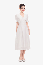 Đầm trắng dáng xòe giả áo khoác