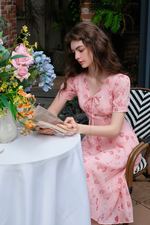 Đầm hoa dáng chữ A xòe cổ V đính nơ