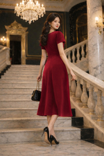 Đầm đỏ dự tiệc dáng A xòe phối nơ