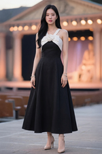 Đầm đen dự tiệc 2 dây đính nơ hoa trắng