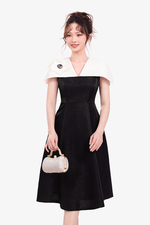 Đầm đi tiệc tafta chữ A đen phối trắng tay cape