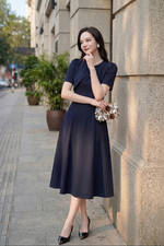 Đầm xòe xanh đen đính cổ áo choàng