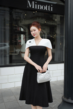 Đầm đi tiệc tafta chữ A đen phối trắng tay cape