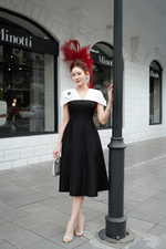 Đầm đi tiệc tafta chữ A đen phối trắng tay cape