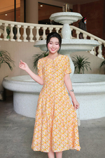 Đầm hoa nhí dáng xòe đính nút