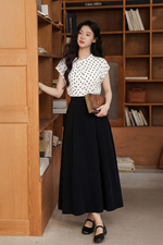 Chân váy đen xòe xếp ly dáng dài