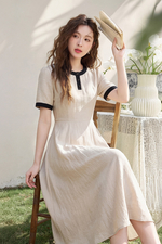 Đầm dài midi xòe cổ tròn phối viền đen