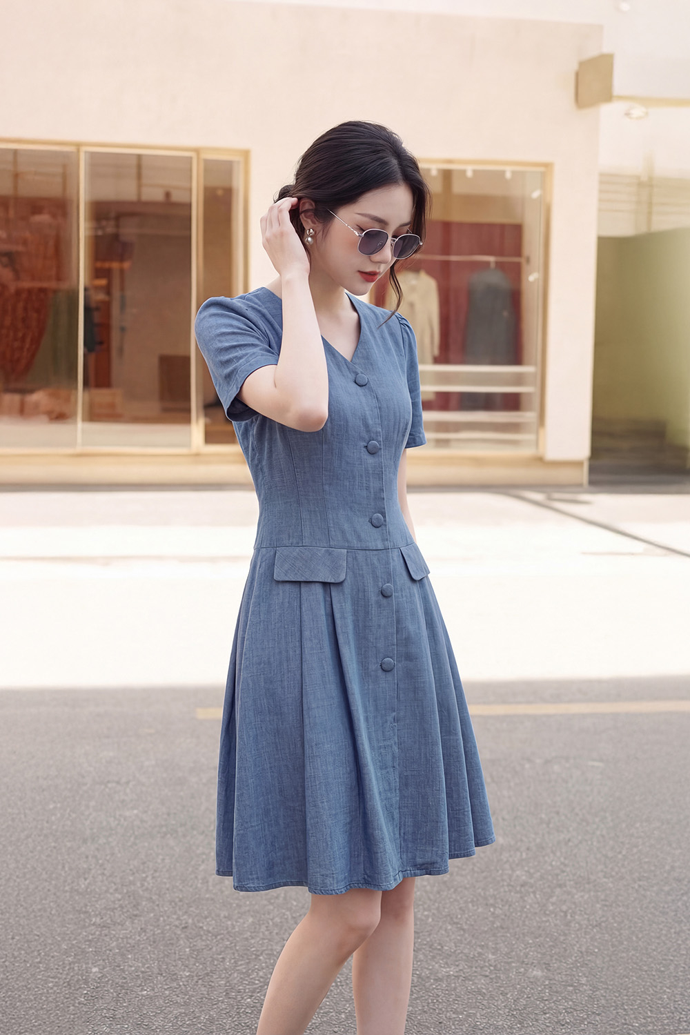 Đầm xòe công sở xếp ly cổ V phối nút