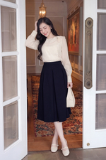 Chân váy xòe xếp ly màu xanh