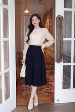 Chân váy xòe xếp ly màu xanh