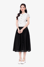 Chân váy xòe đen tơ phối nơ