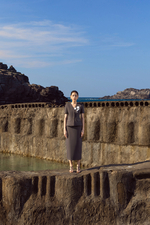 Chân váy dài dáng suông xẻ sau màu xám