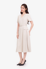 Đầm kem cổ V xếp nhún dáng xòe xếp ly