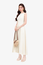 Đầm linen dáng xòe midi sát nách phối nút