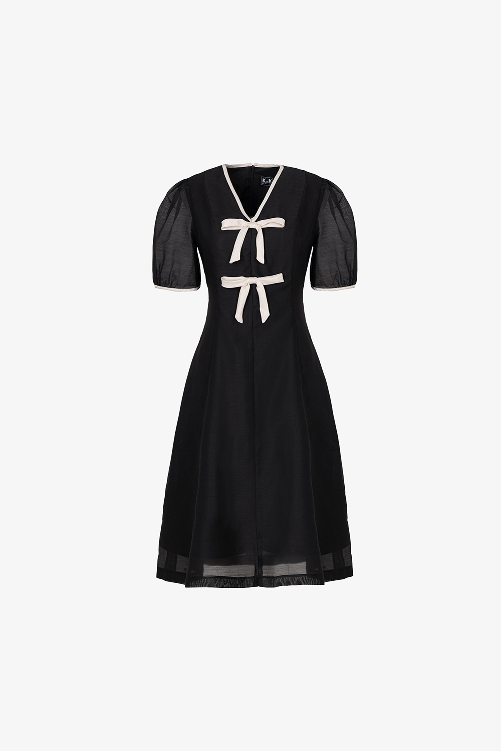 Đầm đen dáng A viền be phối nơ