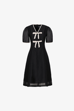 Đầm đen dáng A viền be phối nơ