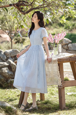 Đầm voan chấm bi xòe tay phồng thắt nơ eo