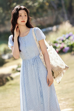 Đầm voan chấm bi xòe tay phồng thắt nơ eo