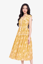 Đầm maxi hoa vàng dáng xòe cổ V phối nơ
