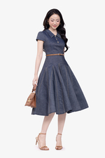 Đầm denim dáng xòe viền chỉ