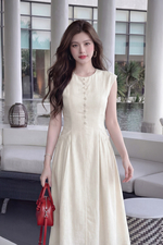 Đầm linen sát nách dáng dài phối nút