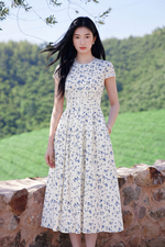 Đầm trắng hoa nhí dáng xòe dài viền ren