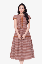 Đầm caro dáng xòe tầng phối nơ