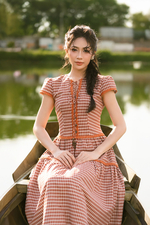 Đầm caro dáng xòe tầng phối nơ