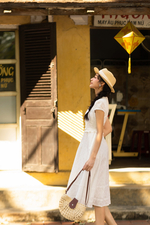 Đầm trắng xô thêu dáng xòe chữ A cổ V