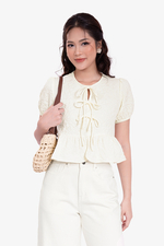 Áo baby doll màu kem tay phồng phối nơ