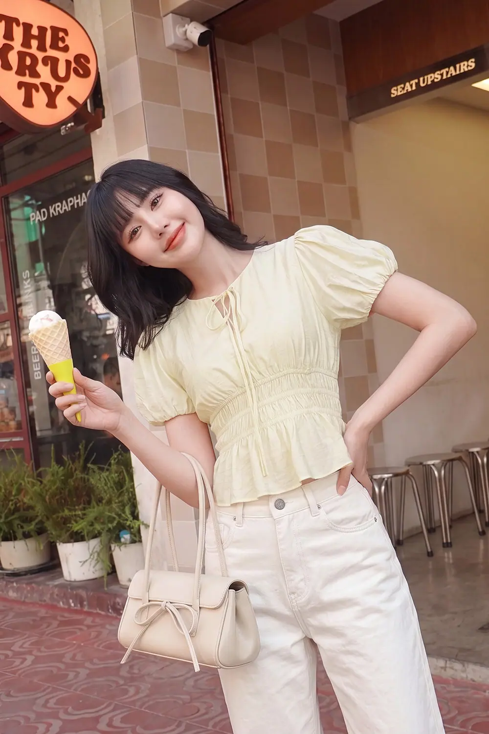 Áo kiểu tay phồng cổ thắt nơ nhún eo