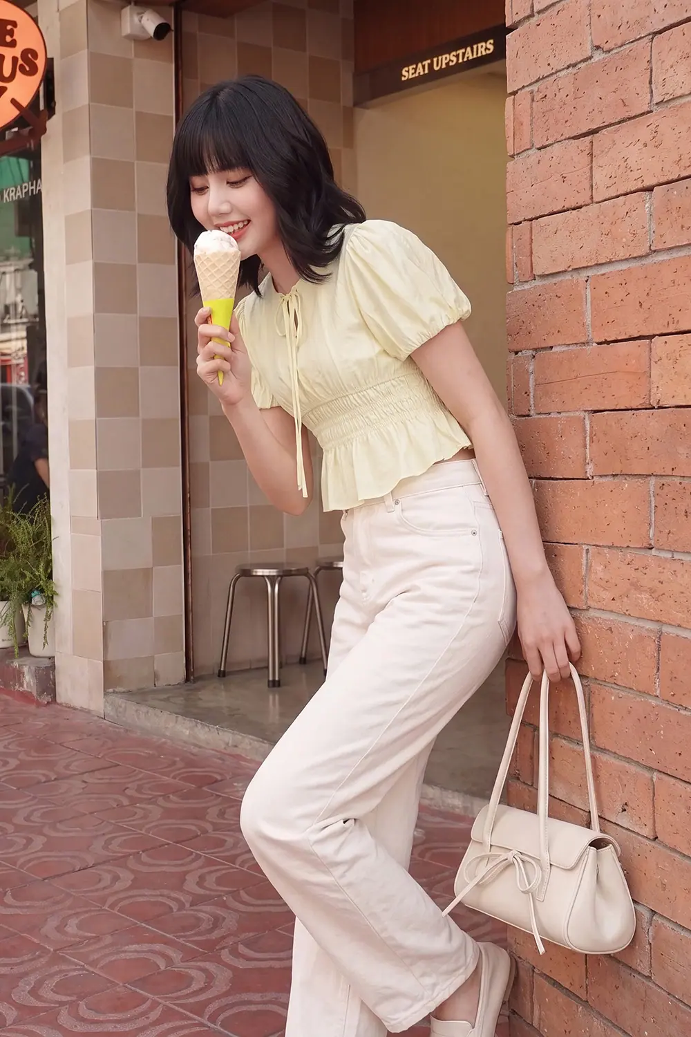 Áo kiểu tay phồng cổ thắt nơ nhún eo