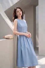 Đầm xòe sát nách màu xanh pastel kèm thắt lưng